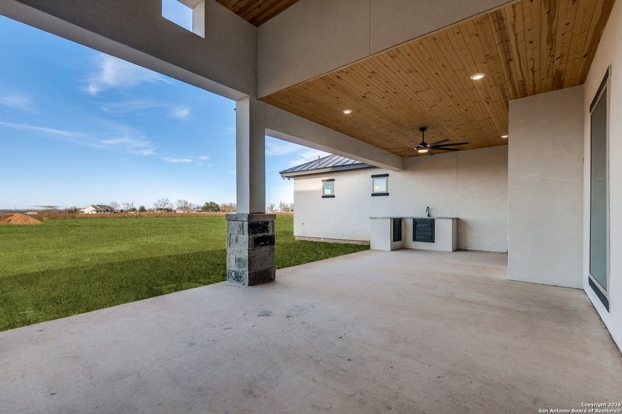 Exterior details and patio area of a home in , Castroville (Image 27).