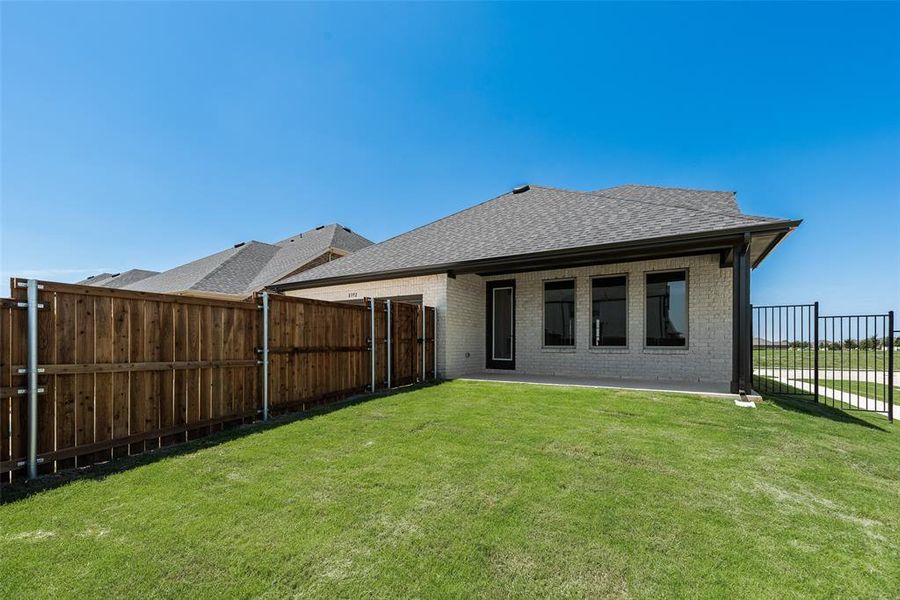 Front exterior of a new home in Villages of Creekwood, Frisco, TX, highlighting curb appeal (Image 17). Front exterior of a new home in Villages of Creekwood, Frisco, TX, highlighting curb appeal (Image 17).