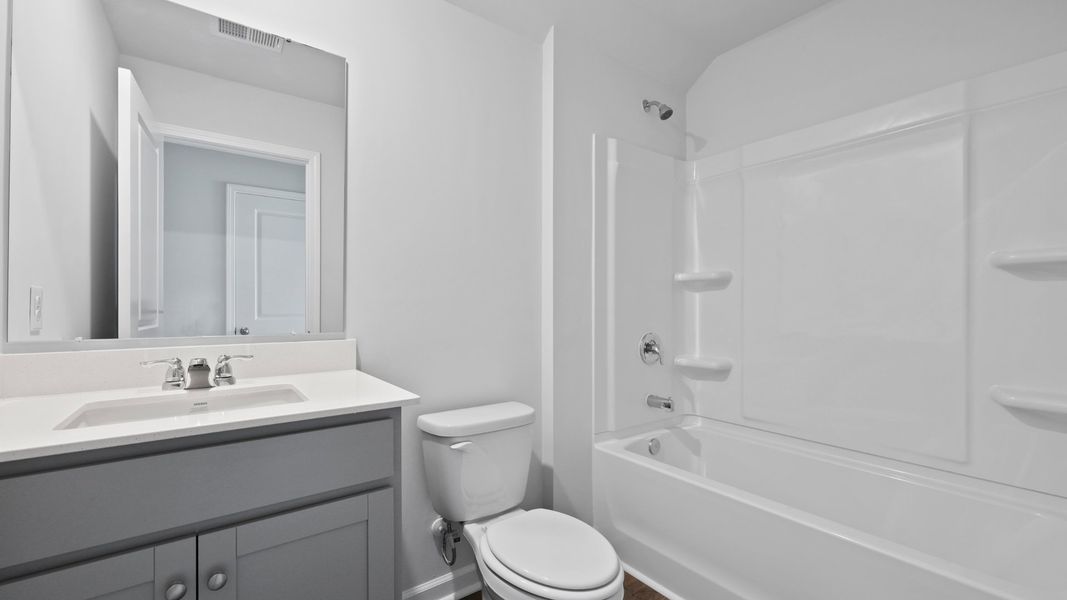 Representative furnished interior of a home built from the DARBY-EXP by D.R. Horton in Hillcrest, Ravenel (Image 15).