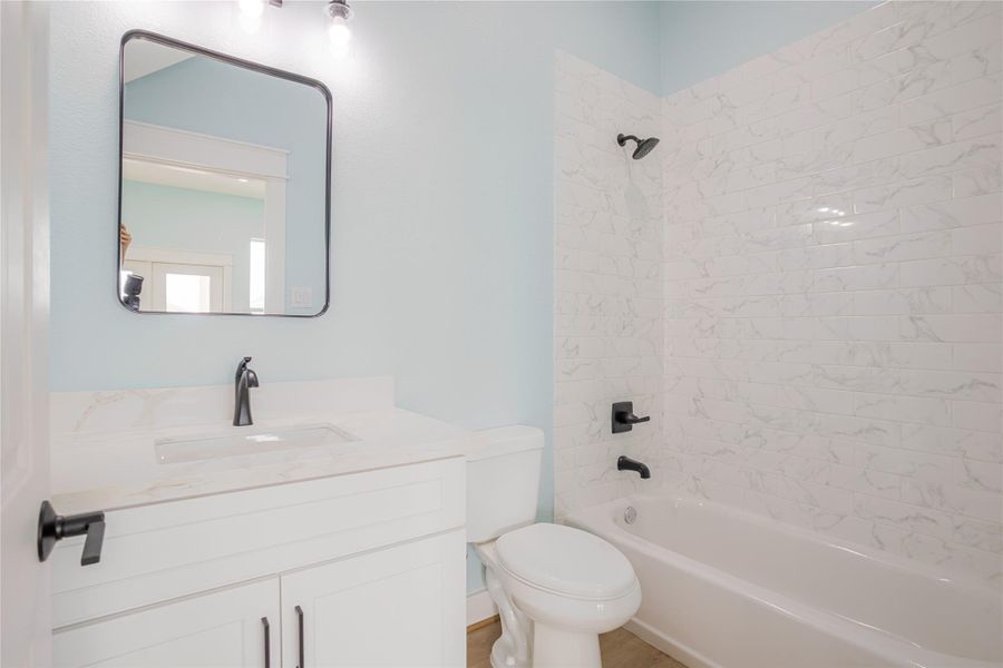 White bath with contemporary black accents