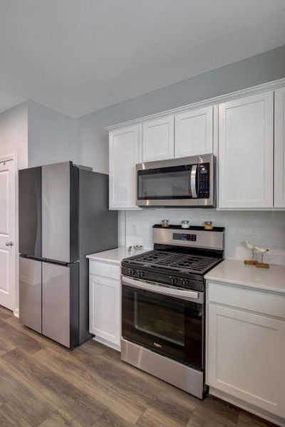 Furnished interior view inside a new home in Sanctuary Cove at Cane Bay, Summerville (Image 9).