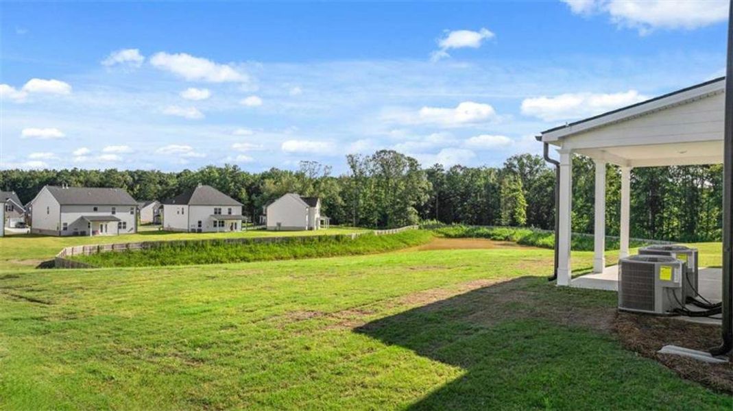Exterior details and patio area of a home in Independence, Loganville (Image 24).
