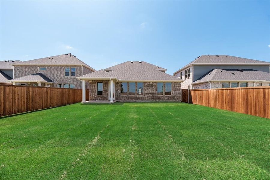 Exterior details and patio area of a home in Arbors at Legacy Hills, Celina (Image 3).