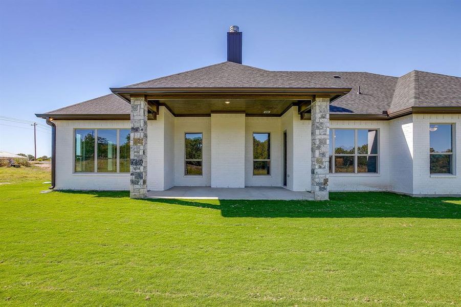 Exterior details and patio area of a home in , Poolville (Image 3). Exterior details and patio area of a home in , Poolville (Image 3).