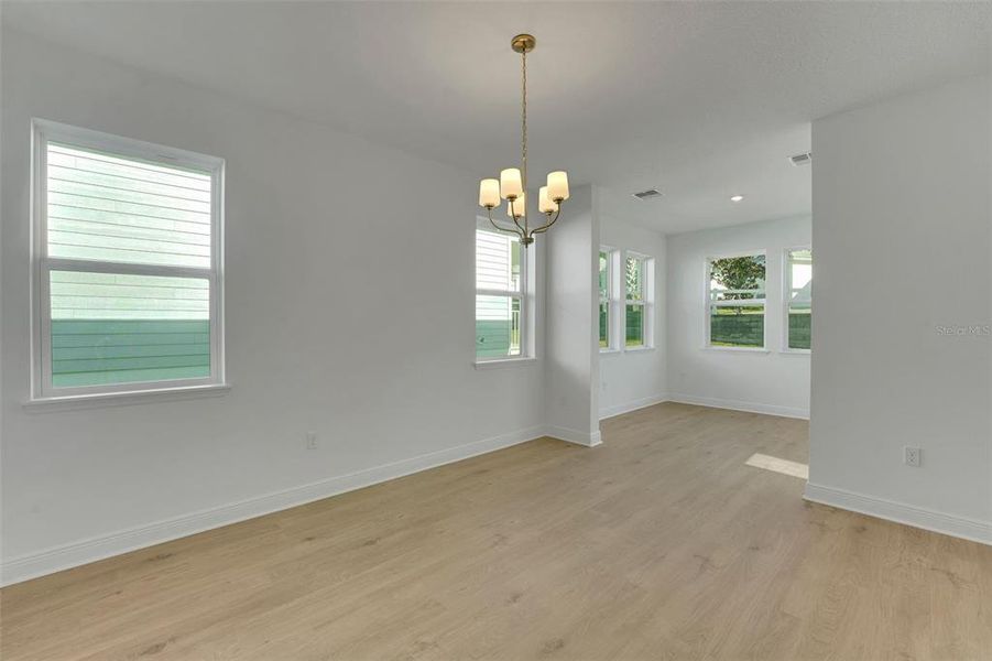 Spacious, unfurnished interior of a new home in Green Key Village, Lady Lake (Image 22).