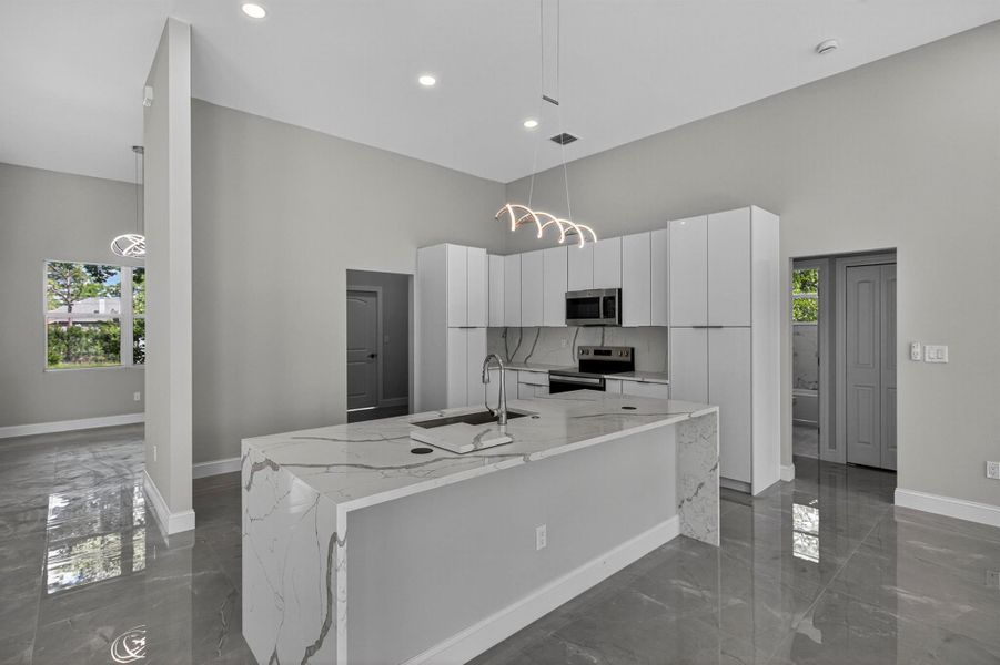 Furnished interior view inside a new home in , The Acreage (Image 8). Furnished interior view inside a new home in , The Acreage (Image 8).