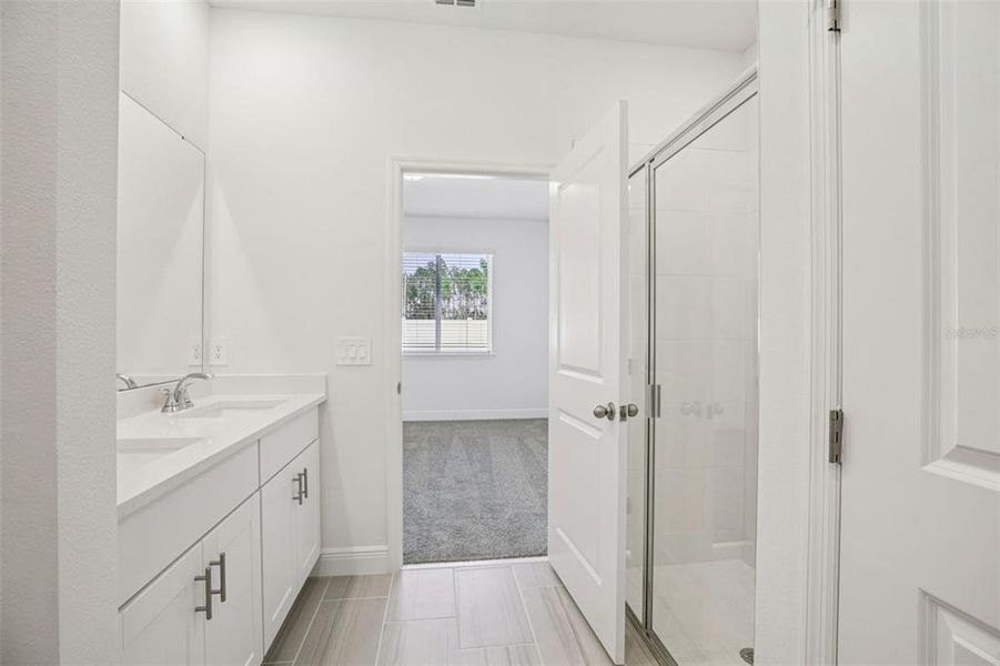Furnished interior view inside a new home in Cyrene at Minneola - Villas, Minneola (Image 14).