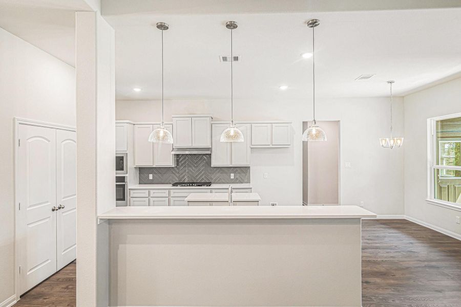 Furnished interior view inside a new home in Deer Pines, Conroe (Image 6).