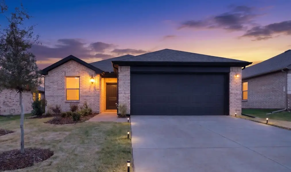 Front exterior of a new home in Stonecreek, Sulphur Springs, TX, highlighting curb appeal (Image 2). Front exterior of a new home in Stonecreek, Sulphur Springs, TX, highlighting curb appeal (Image 2).