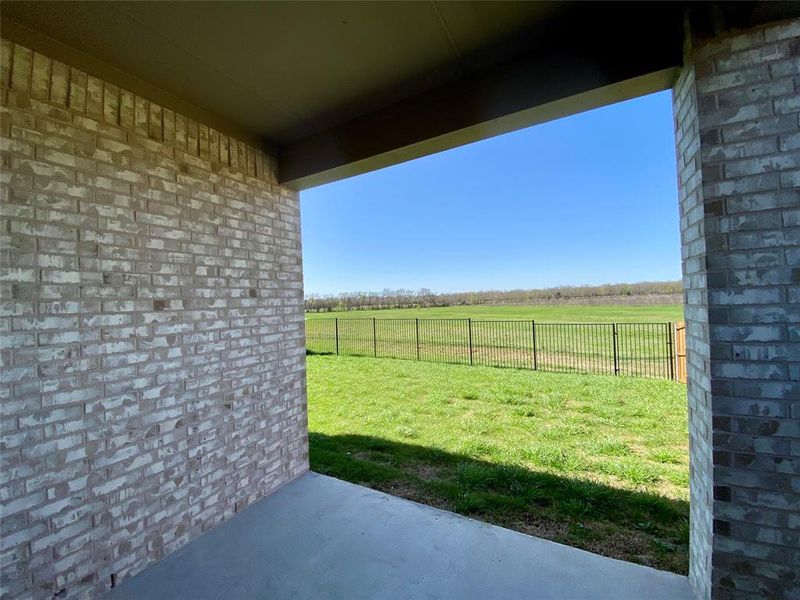 Great covered patio would be perfect for grilling