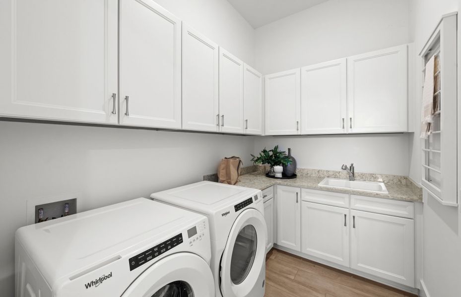 Laundry room with tons of storage options Laundry room with tons of storage options