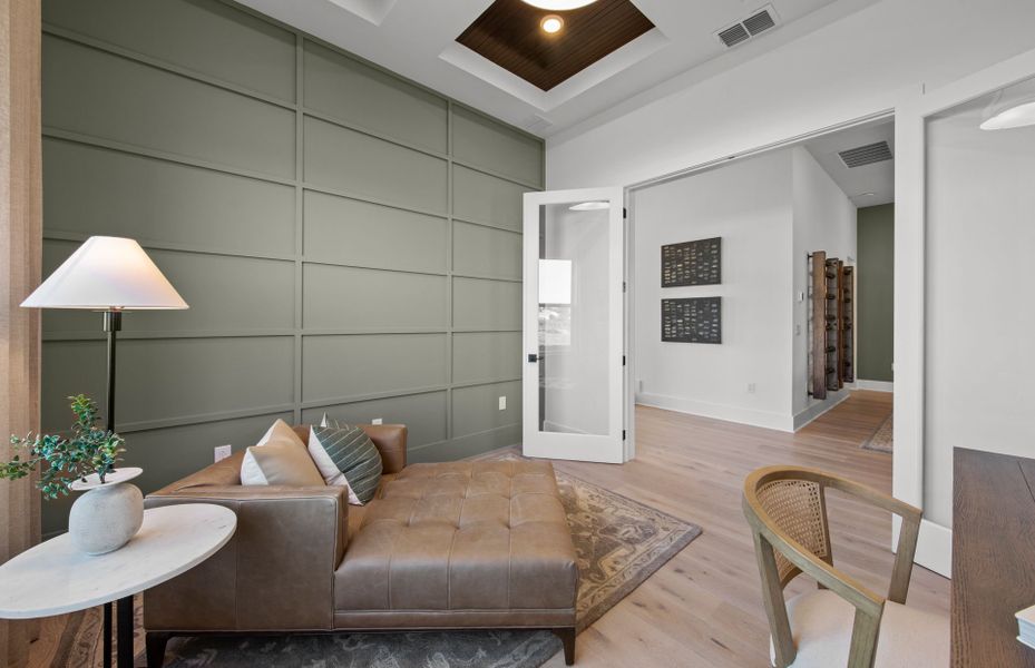 Representative furnished interior of a home built from the Layton Grande by DiVosta in BeachWalk by Manasota Key, Englewood (Image 13).
