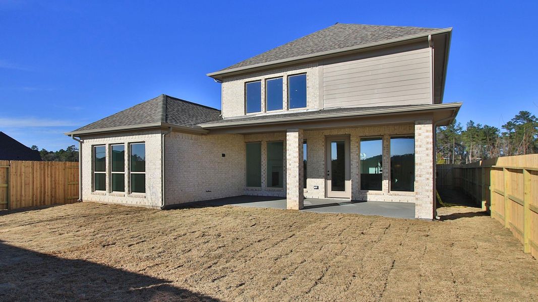 Exterior details and patio area of a home in Artavia, Conroe (Image 2).