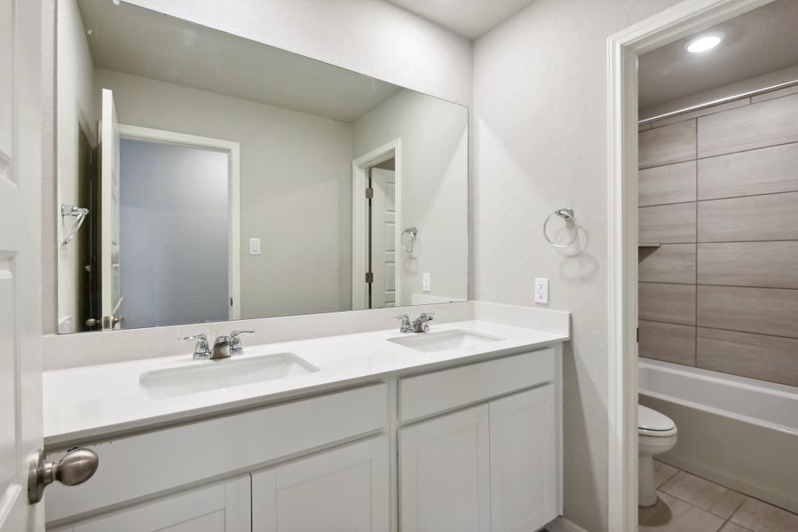 Guest bathroom in the Medina floorplan at a Meritage Homes community.