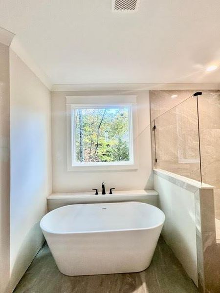 Furnished interior view inside a new home in , Carrollton (Image 1).