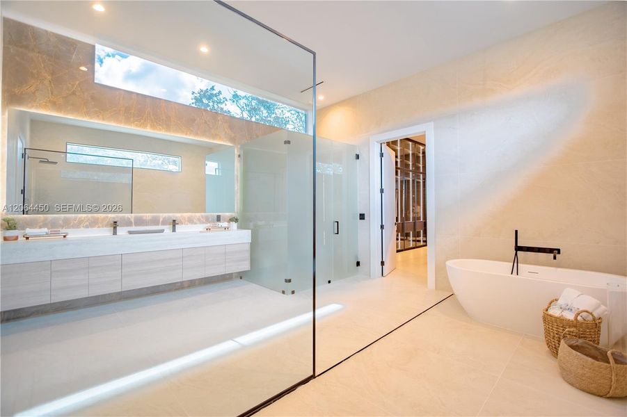 Spa inspiring primary suite bathroom