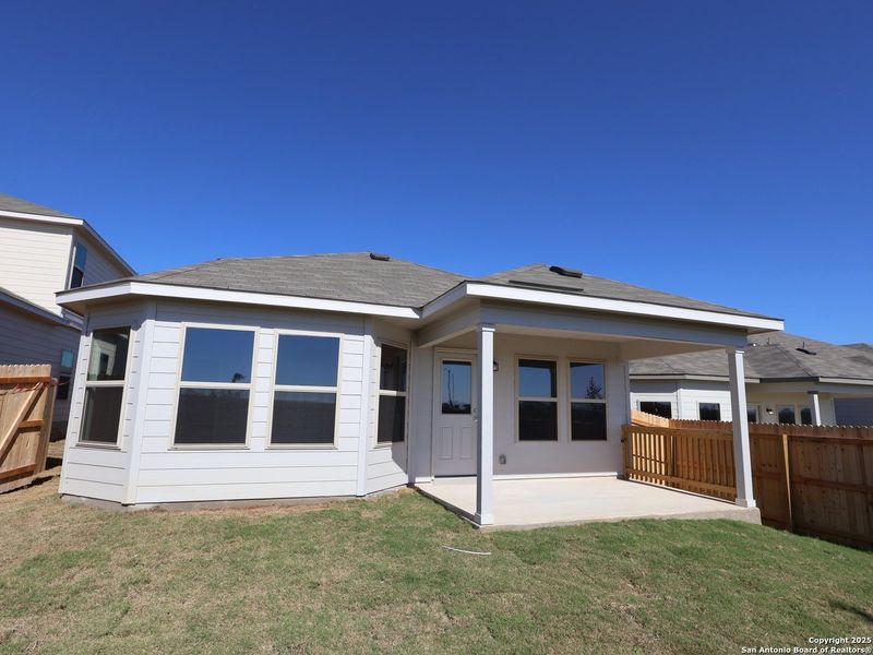 Exterior details and patio area of a home in Paloma Park, Converse (Image 20).