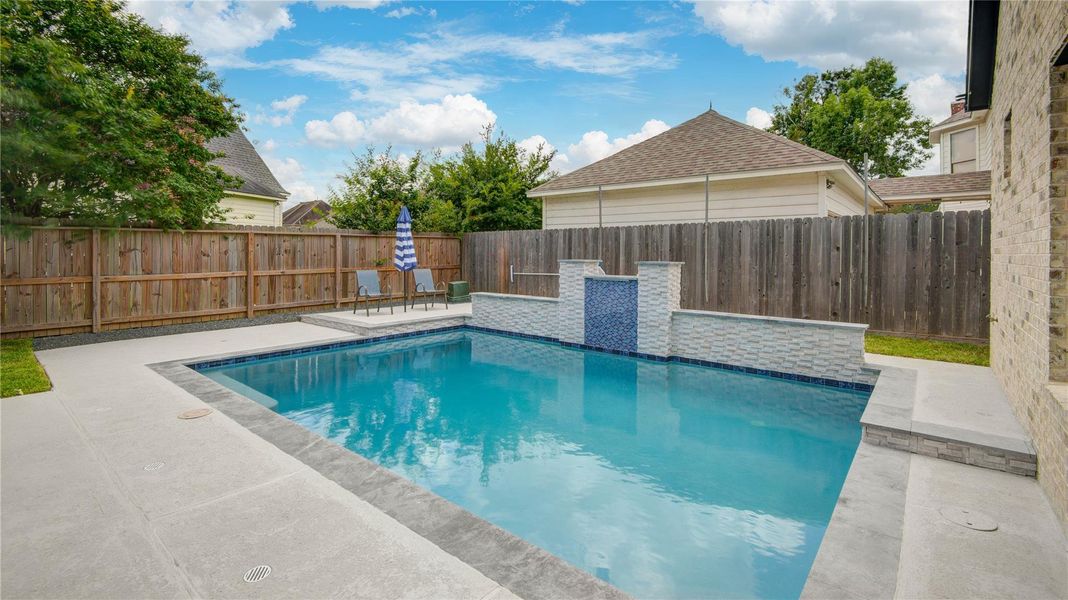 Exterior details and patio area of a home in , Spring (Image 4).