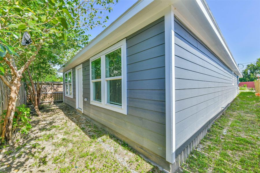 Exterior details and patio area of a home in , Houston (Image 3). Exterior details and patio area of a home in , Houston (Image 3).