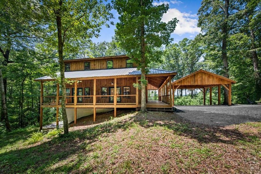 Exterior details and patio area of a home in , Ellijay (Image 23).
