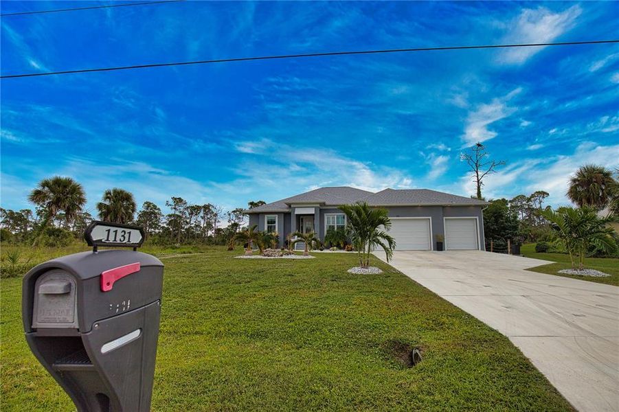 Front exterior of a new home in , Rotonda West, FL, highlighting curb appeal (Image 25).