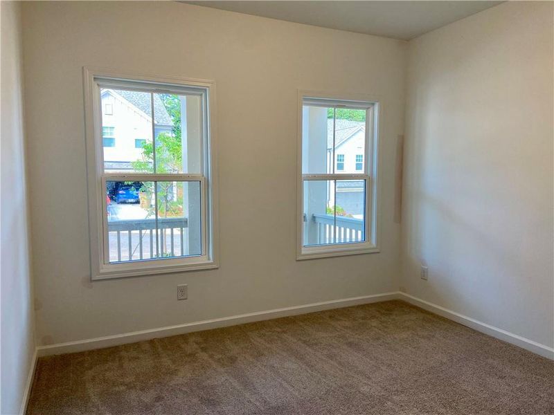Spacious, unfurnished interior of a new home in Eastlyn Crossing, Flowery Branch (Image 15).