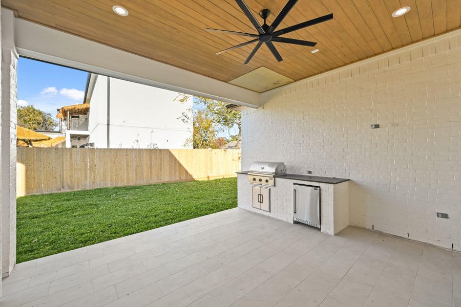Your 17x16 covered patio includes a summer kitchen!