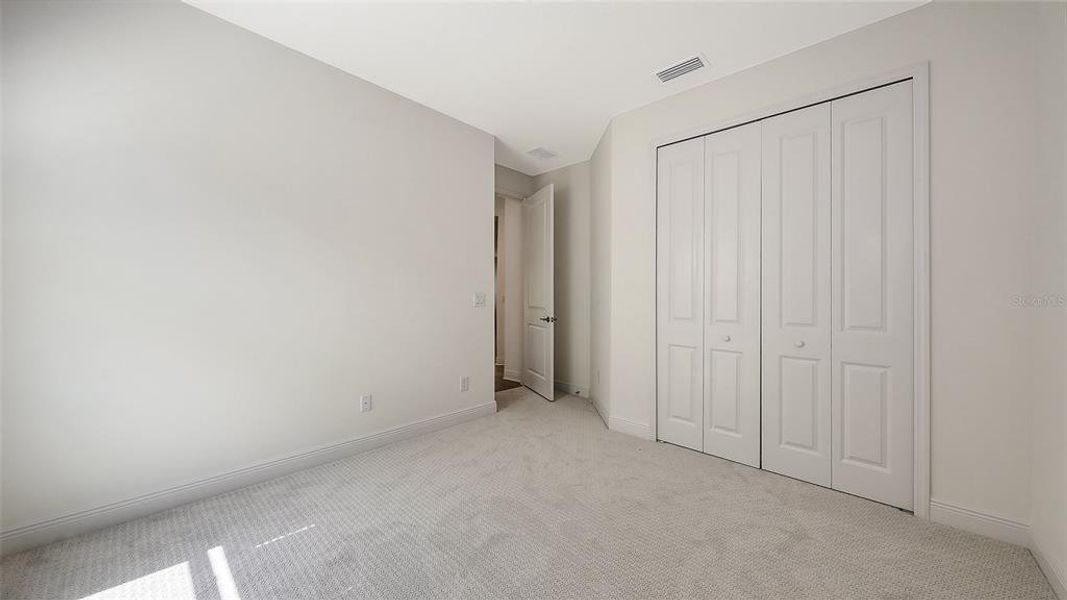 Spacious, unfurnished interior of a new home in Palm Grove, Lakewood Ranch (Image 14).