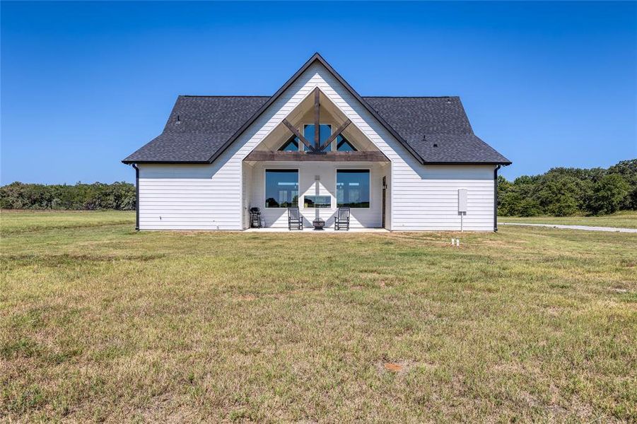 Front exterior of a new home in , Bowie, TX, highlighting curb appeal (Image 22).