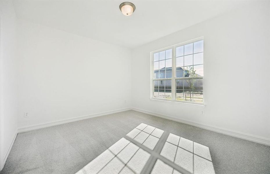 Comfortable bedroom with a bright window view