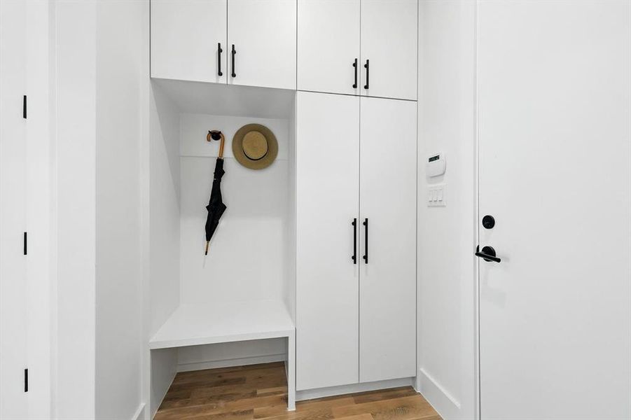Mudroom featuring wood finished floors Mudroom featuring wood finished floors