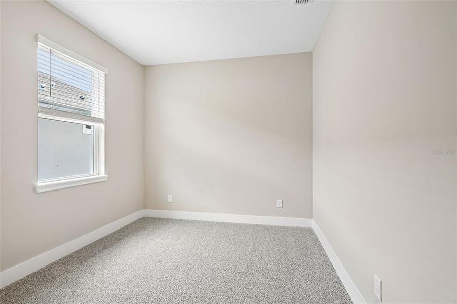 Spacious, unfurnished interior of a new home in Legends Preserve - Signature Series, Daytona Beach (Image 31).