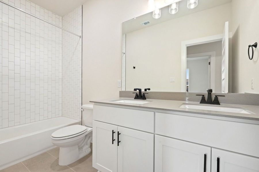 Furnished interior view inside a new home in Heritage, Dripping Springs (Image 19).