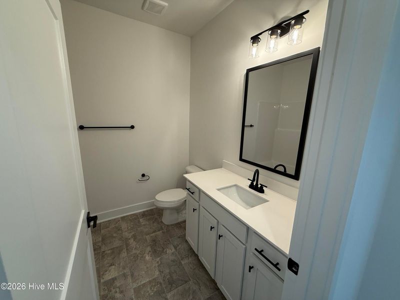 Furnished interior view inside a new home in Wood Creek Landing, Leland (Image 10).