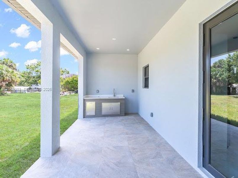 Exterior details and patio area of a home in , Naples (Image 21). Exterior details and patio area of a home in , Naples (Image 21).