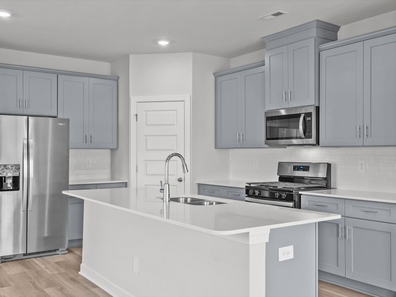 Furnished interior view inside a new home in Northbrook Village Townes, Taylors (Image 4).