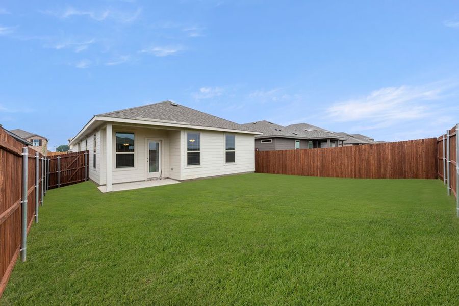 Representative exterior photo of a completed home built from the Hickory by Impression Homes in Creekside Ranch, Blue Ridge, TX (Image 24).