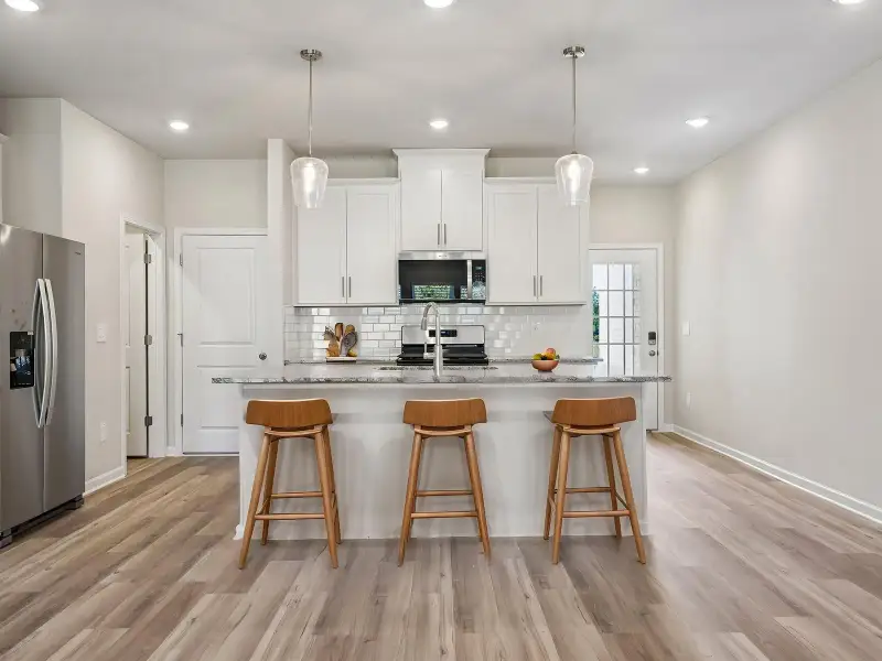 Furnished interior view inside a new home in Brooks Lake, Loganville (Image 3).