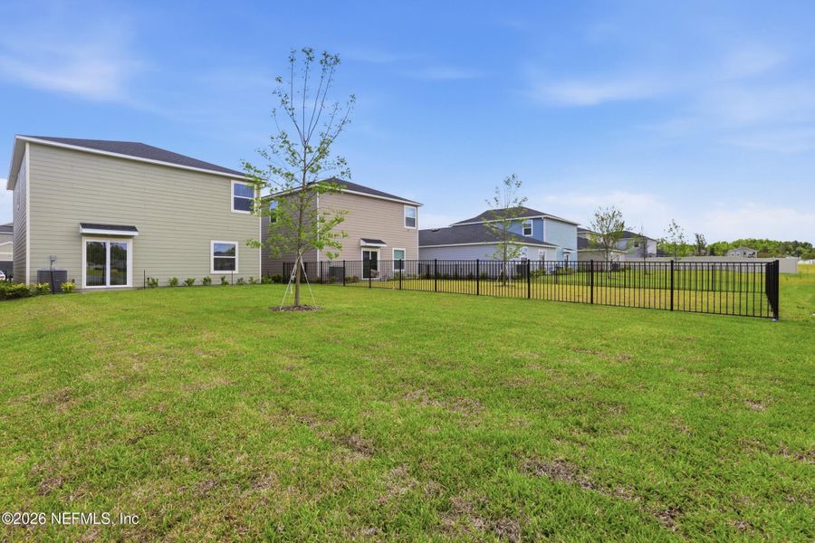 Exterior details and patio area of a home in Holstein Crossing, Green Cove Springs (Image 3).