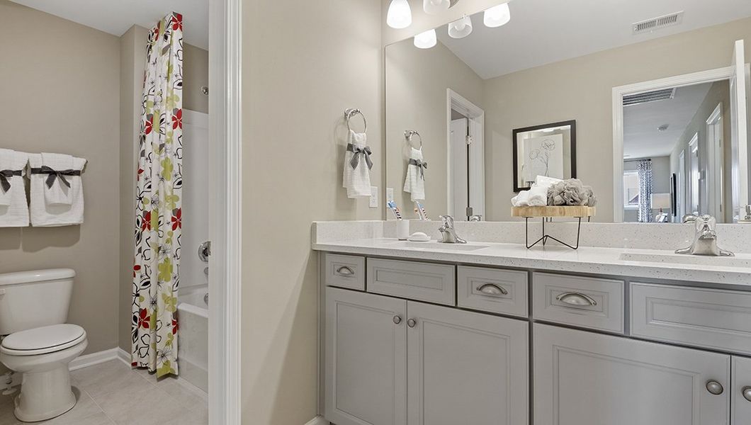 Representative furnished interior of a home built from the Windsor by D.R. Horton in Harrison Valley, Simpsonville (Image 30).