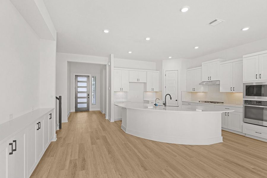 Furnished interior view inside a new home in Lariat, Liberty Hill (Image 46). Furnished interior view inside a new home in Lariat, Liberty Hill (Image 46).