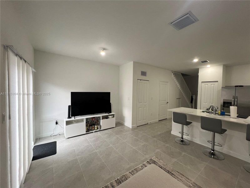 Furnished interior view inside a new home in , Miami Gardens (Image 12).