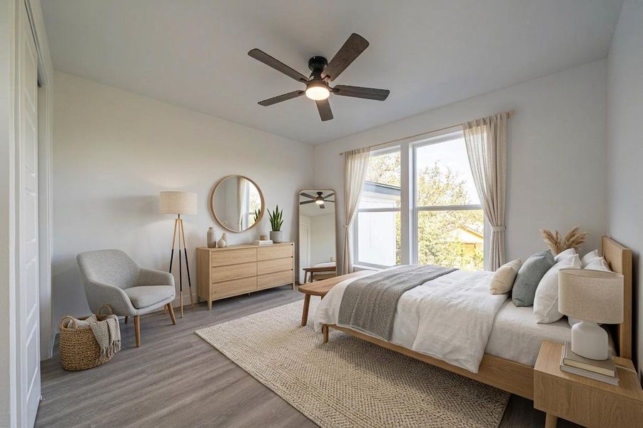 Smooth wood floors and tall windows define this peaceful, neutral sleeping space. Smooth wood floors and tall windows define this peaceful, neutral sleeping space.