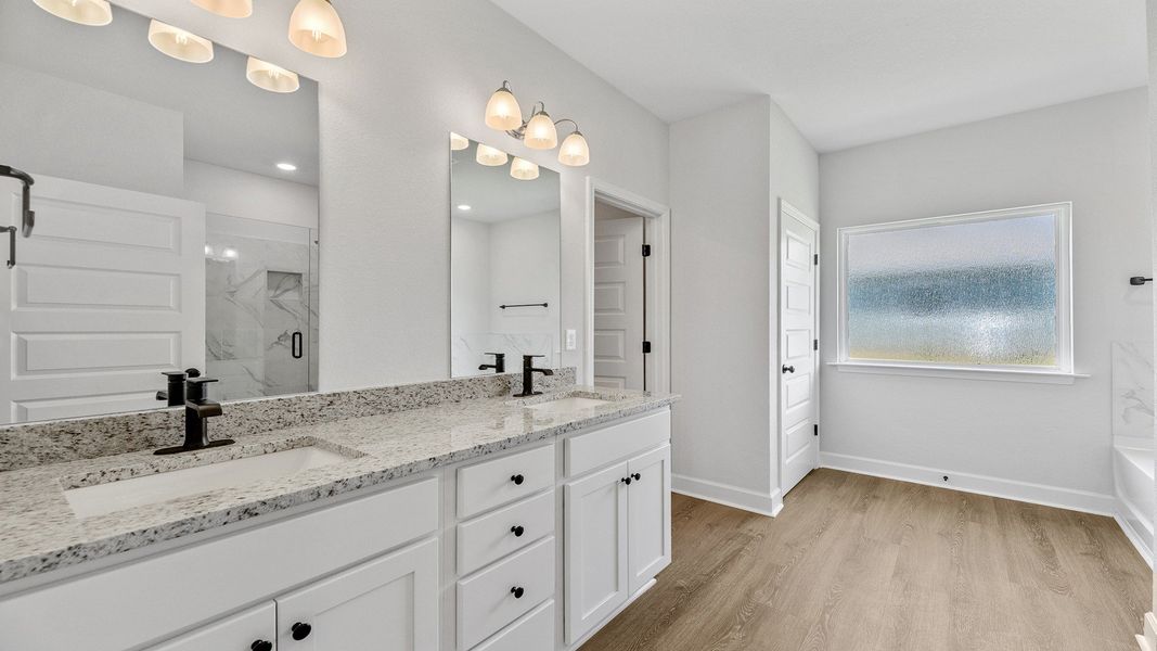 Representative furnished interior of a home built from the The Jasmine by D.R. Horton in Meadows at Rehwinkel, Crawfordville (Image 22).