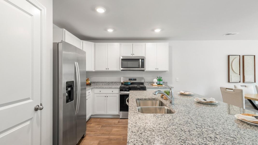 Furnished interior view inside a new home in Pine Hills Townhomes at Cane Bay, Summerville (Image 3).