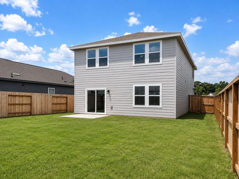 Exterior details and patio area of a home in Stonebrooke, Conroe (Image 4).