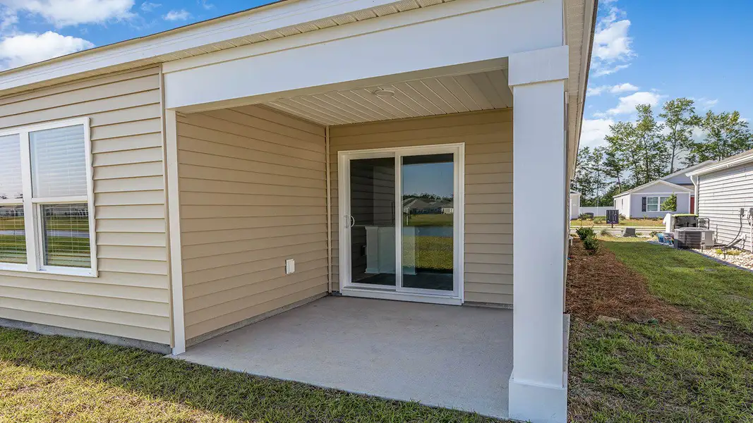 Representative exterior photo of a completed home built from the KERRY by D.R. Horton in Kingston Bay, Conway, SC (Image 12).