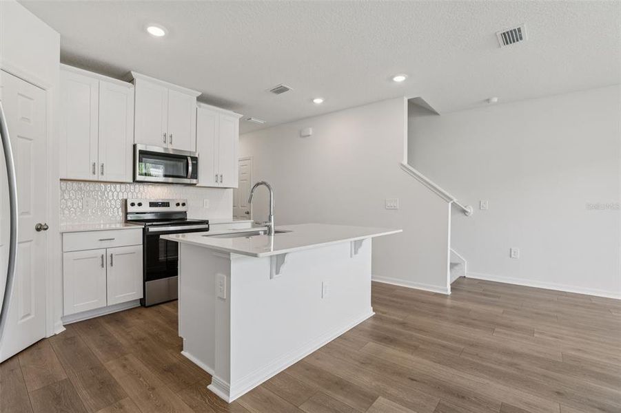 Furnished interior view inside a new home in Cagan Crossings West, Clermont (Image 10).