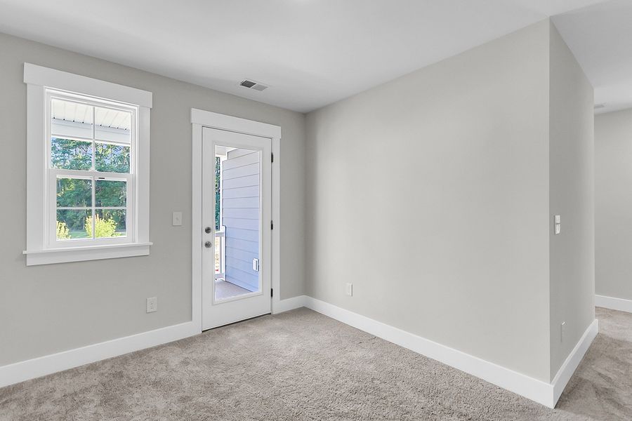 Spacious, unfurnished interior of a new home in Pineland Preserve, Summerville (Image 43).