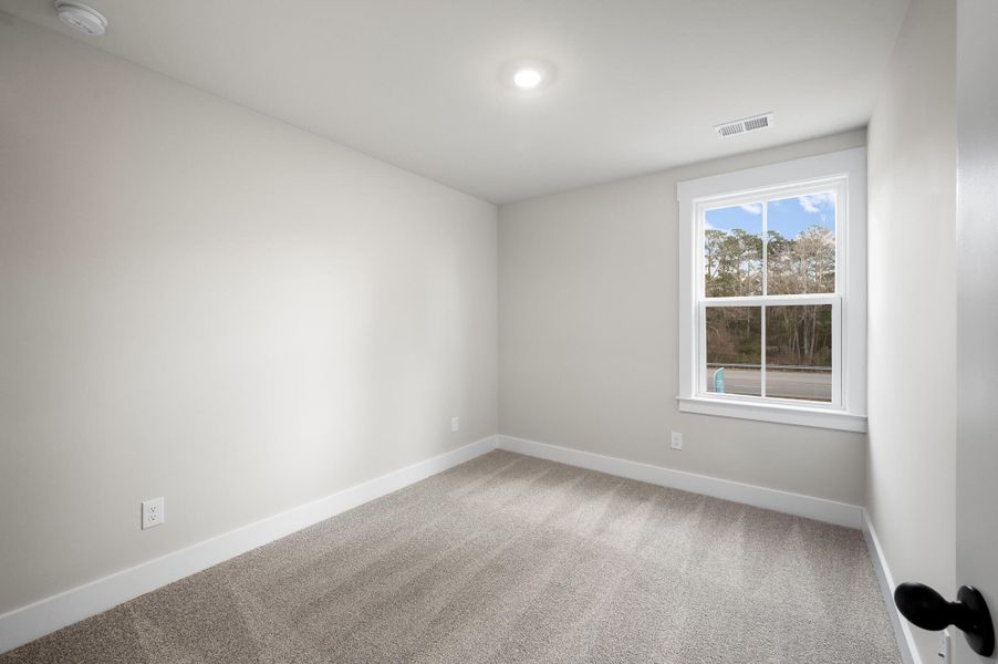 Photo is of a similar home